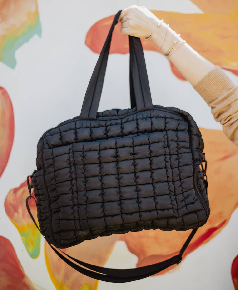 Sac de voyage matelassé noir avec poche passe-partout