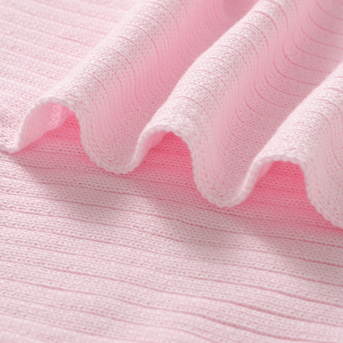 Couverture bébé côtelée en coton biologique rose de luxe
