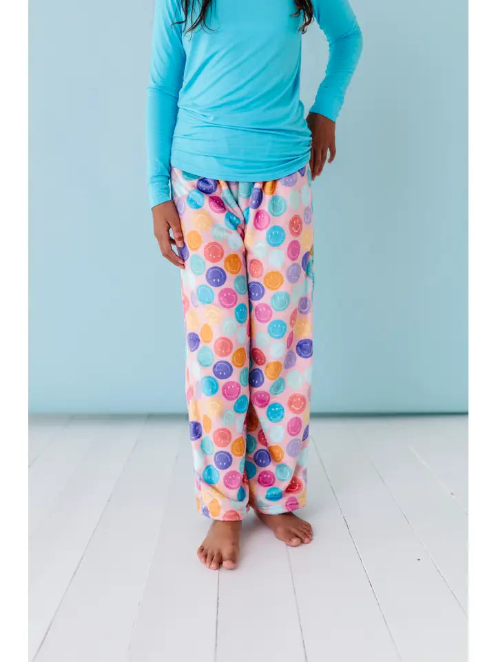 Pantalon en peluche souriant