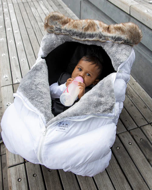 Siège auto 7AM Cocoon - Tundra Blanc avec fausse fourrure
