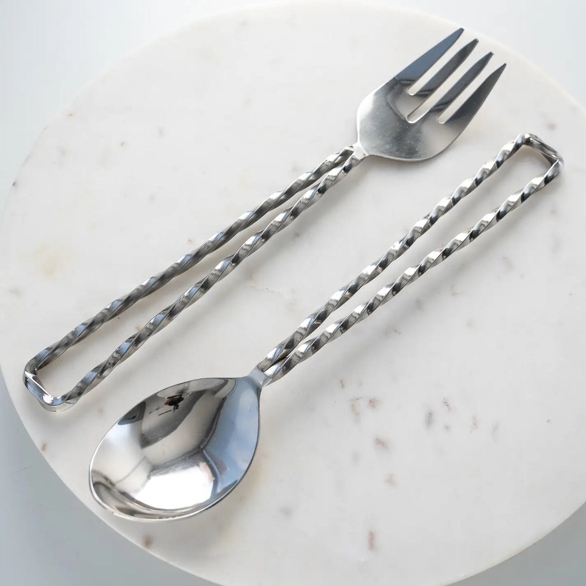 Serveurs à poignée ouverte torsadée