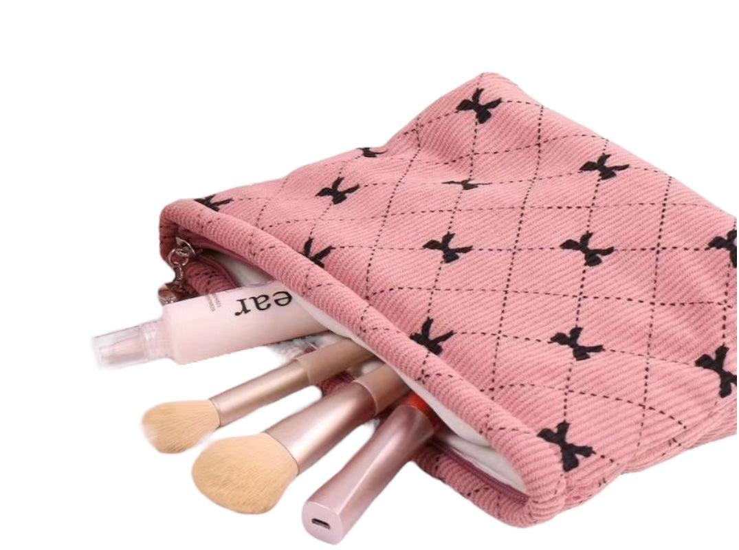 Grande trousse de toilette en velours côtelé avec nœud papillon