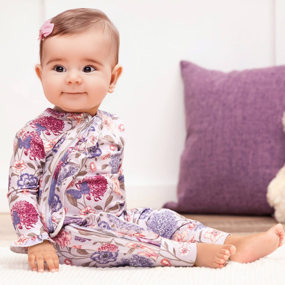 Pyjama bébé à fermeture éclair avec nœud floral