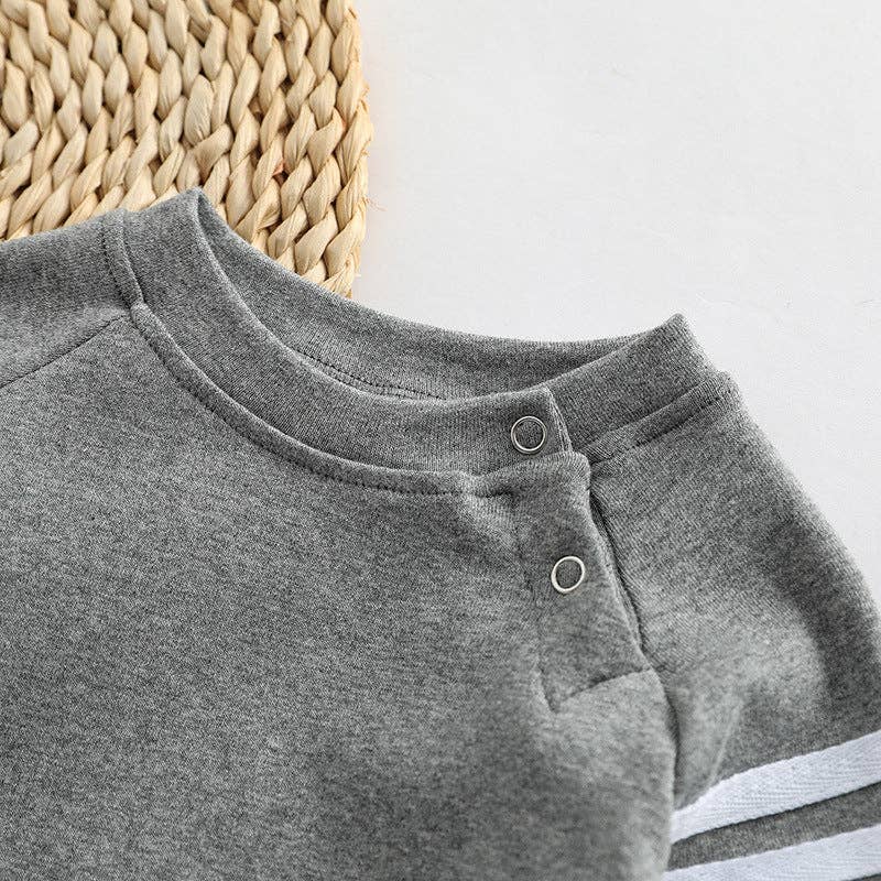 Pull en coton à manches rayées sur les côtés